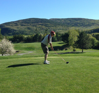 Thomas B. Wheatley Playing Golf